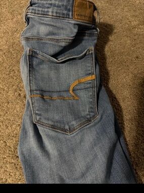 American Eagle Outfitters Light Blue Skinny Jeans with Gold Stitching